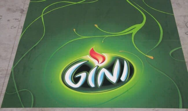 Tapis publicitaire pour la marque Gini